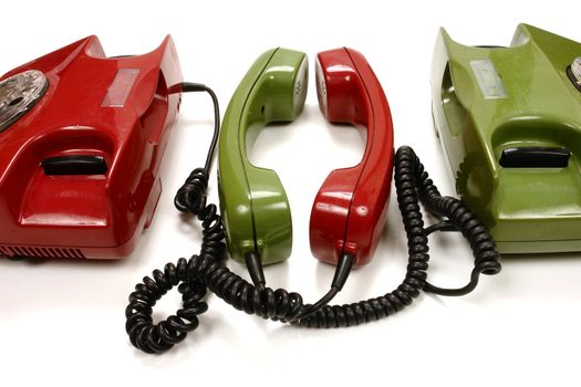 colourful retro phones symbolizing conference/teamwork/network............