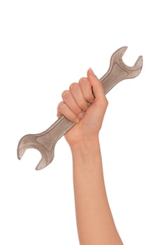 woman holding big spanner in the hands