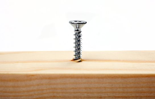 Screw in a piece of wood.