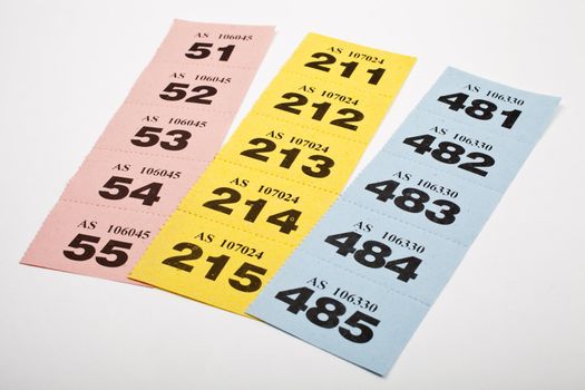 Three strips of Raffle tickets.