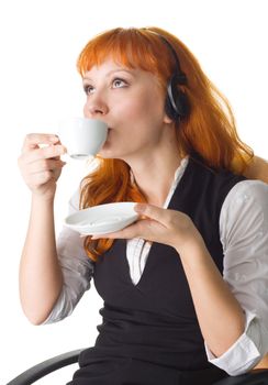 Attractive businesswoman having a coffee break