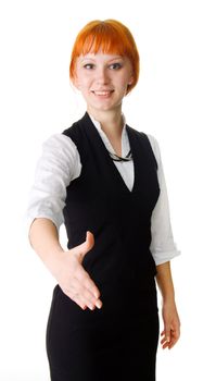 Young businesswoman proposing a handshake, white background