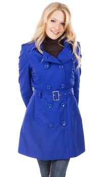Pretty model in blue coat against white background