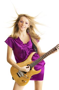 Hot girl playing an electric guitar, isolated on white background
