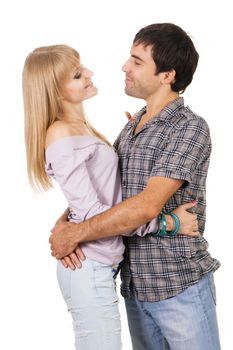 Romantic young couple in casual clothing, white background