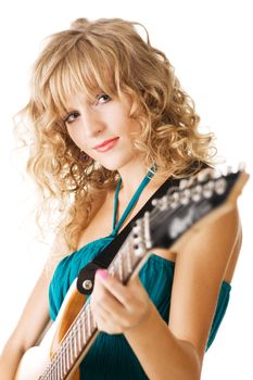 Pretty young woman playing an electric guitar