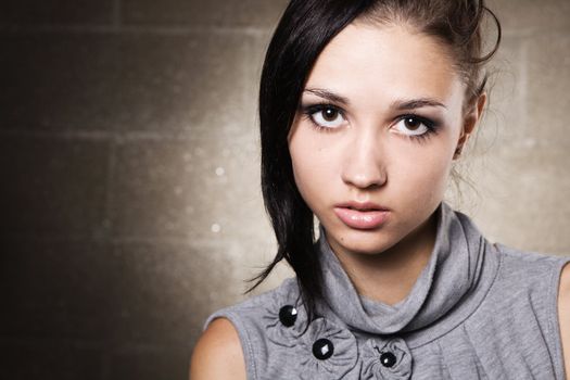 Studio portrait of a beautiful fashionable model 