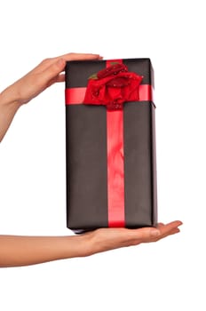 woman giving a black box with red rose as a gift