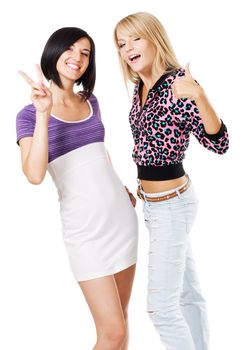 Two young beautiful women showing "Thumbs up" and ''Peace'' signs, white background 