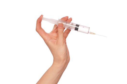 syringe in the woman's hand for making injections