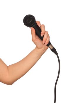 woman holding big black microphone for singing