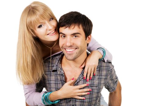 Beautiful young couple in casual clothing, white background
