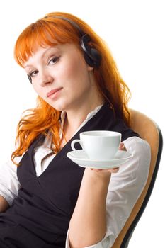 Attractive businesswoman having a coffee break