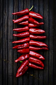 Espelette peppers hanging at a door