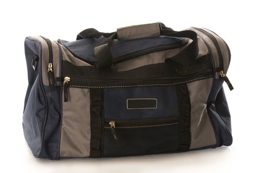 blue and grey duffel or luggage bag with reflection on white background