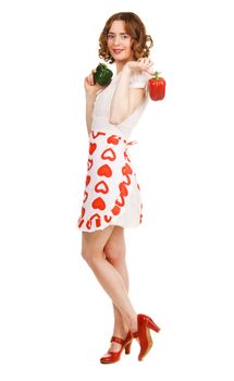 Young beautiful woman with fresh paprikas, white background