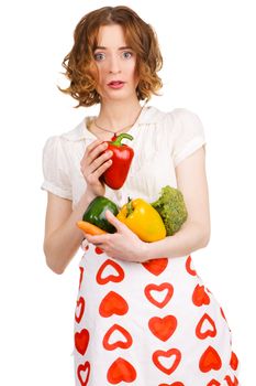Young beautiful woman holding out a paprika, white background