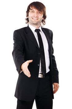 Young elegant businessman reaching open hand, white background