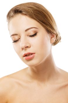 Face portrait of a young beautiful model over white background