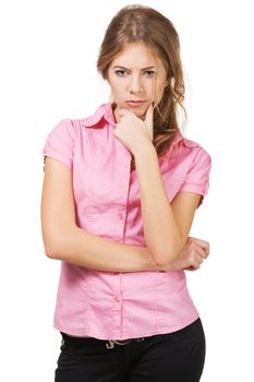 Portrait of pretty severe young woman against white background