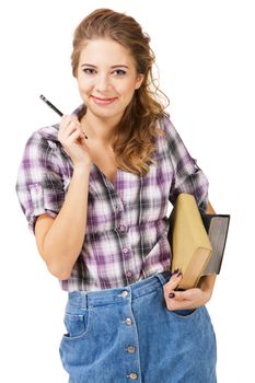 Lovely student girl with a pencil and books, white background 