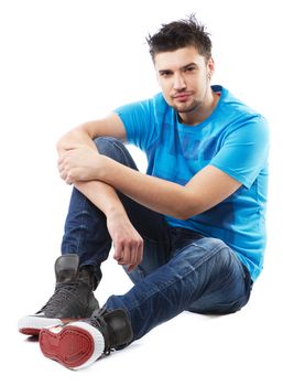 Young handsome man studio portrait, isolated on white background