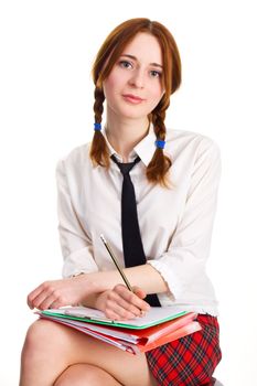 Beautiful lady writing on a worksheet, white background