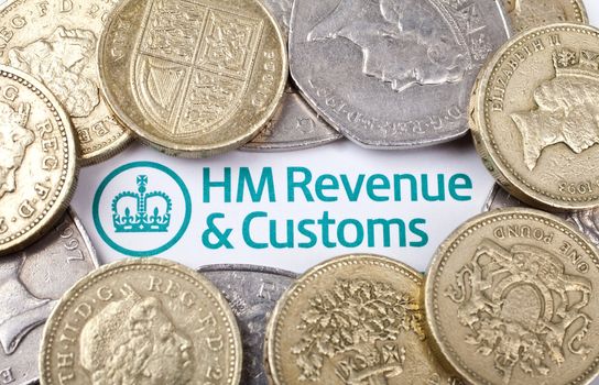 Revenue and Customs heading surrounded by coins.