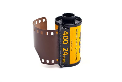 A roll of Photographic film on a white background.