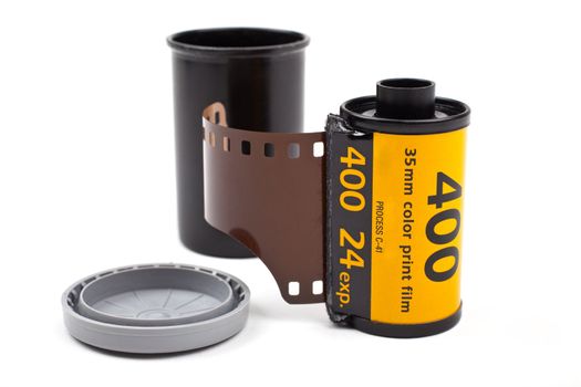 A roll of Photographic film on a white background.