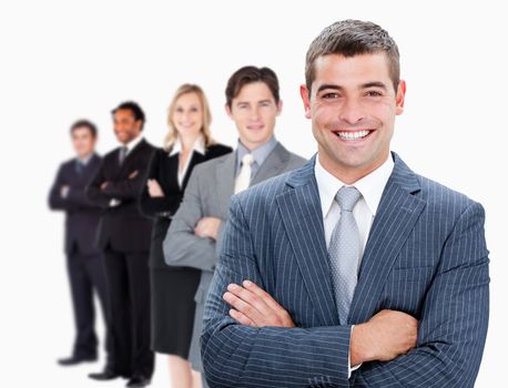 Businesspeople standing in a row against white background