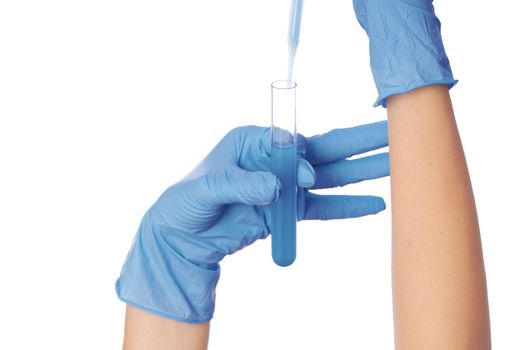 doctor in blue gloves holds a tube with sample of new antidote