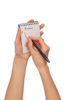 businesswoman writes missions for a business plan