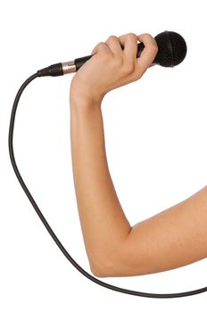 woman holding big black microphone for singing