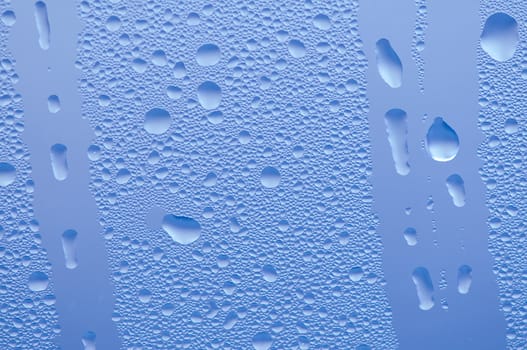 Water bubbles on the window for background