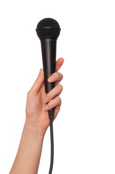 woman holding big black microphone for singing