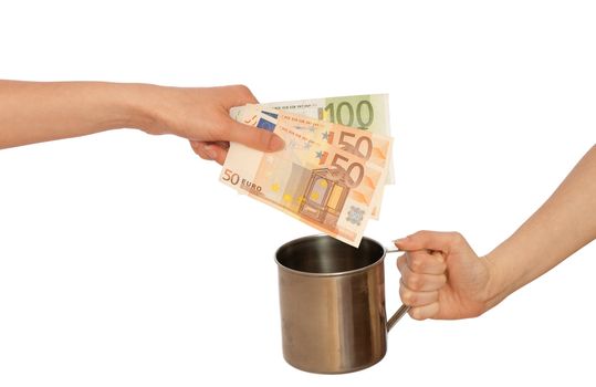 woman giving alms in euro to another woman
