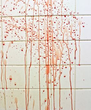 blood with streaks on bathroom tiles