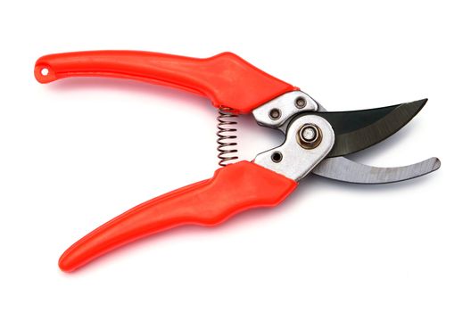 Red garden secateurs isolated on a white background 
