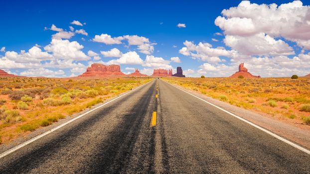 Long road in Monument valley national park, USA