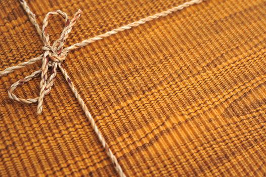 Brown cardboard box with string