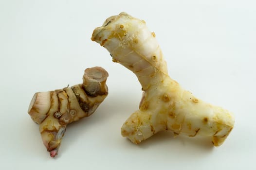 Galangal oil in isolated white background