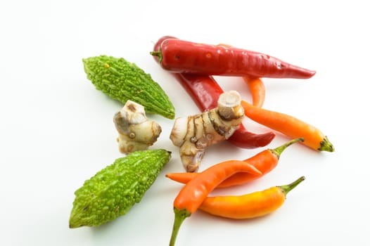 Fresh vegetables on a white background.