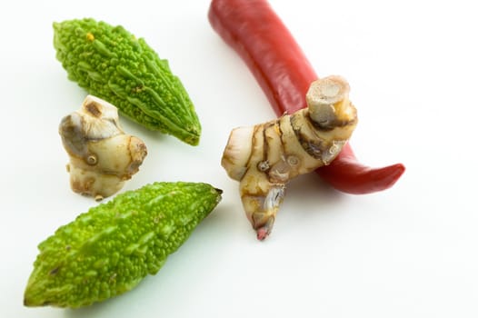 Fresh vegetables on a white background.