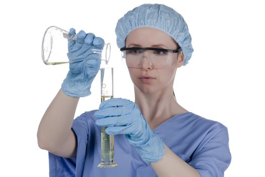 Female chemist mixing chemicals in test tube