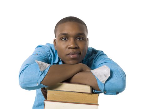 Close-up image of a male student with books against the white surface 