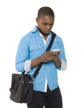 Portrait of young student looking to his phone against white background