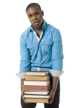 Close-up image of a male student holding books isolated on a white surface