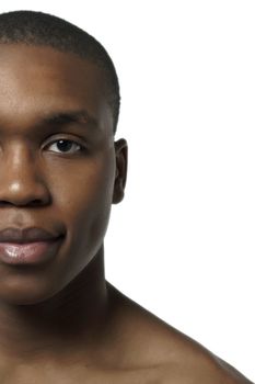 Close-up half face of a Dark man against the white background