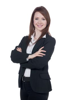 Close-up image of a happy businesswoman with arm crossed against the white surface